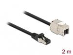 Delock Kabel ze zástrčky RJ45 na zásuvku RJ45 modulu Keystone, Cat.6A, délka 2 m, černý